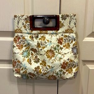 Mid size vintage floral cloth clutch